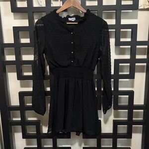 J for Justify black long-sleeved smocked mini dress.